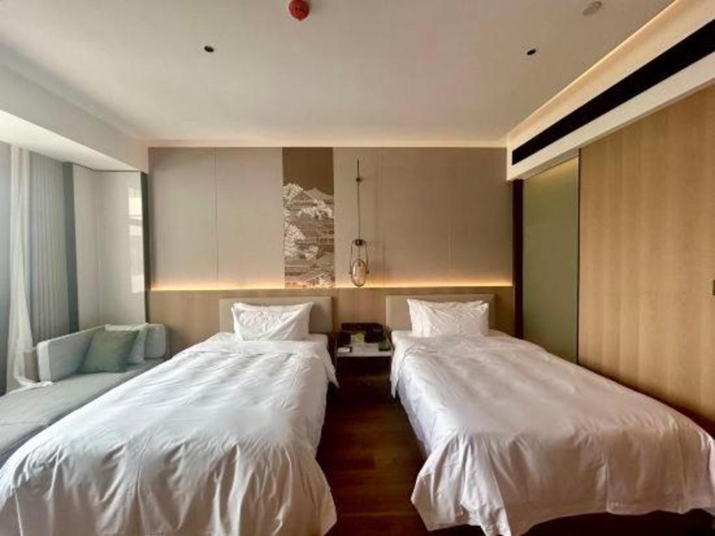 Zhangjiagang Jiangnan Garden Hotel Exterior foto